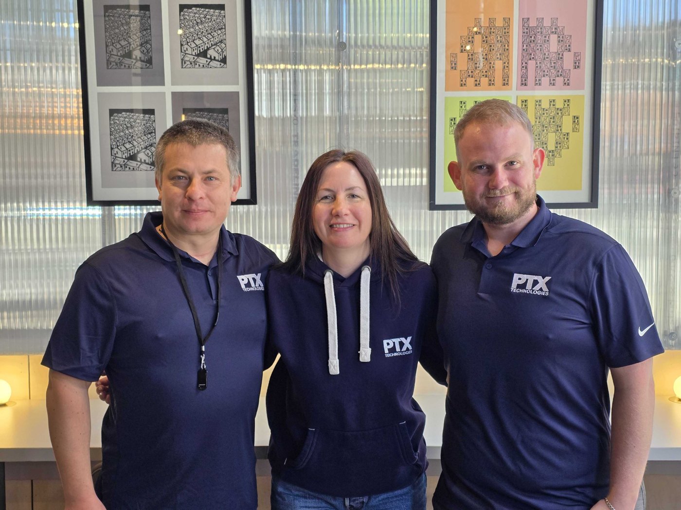 PTX team members at the office